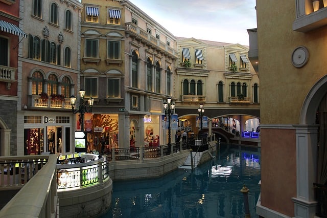 the venetian hotel macau shops and large pond gondolas
