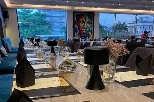 Aesthetic view of indoor seating and table setting at Noir Lagos