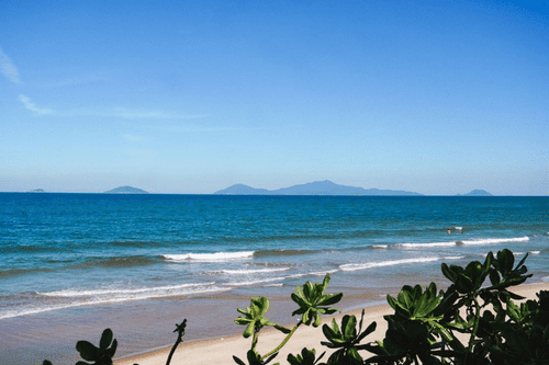 Cua Dai beach's turquoise water and beautiful dunes