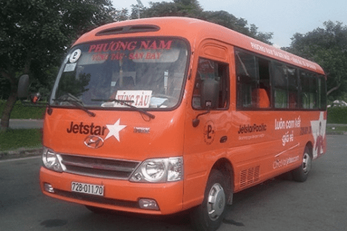 Jetstar Pacific Shuttle Bus with airline's distinguishing color - orange 