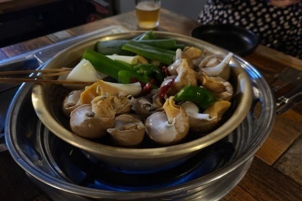 A bowl of sea snails. 