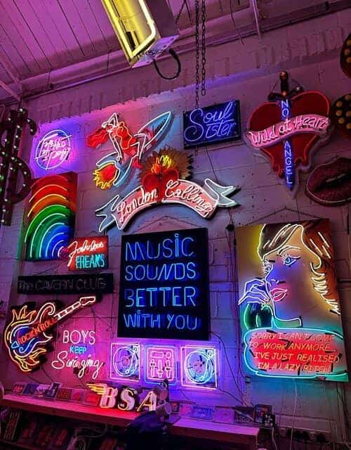 A picture of signs sold at God’s Own Junkyard in London.