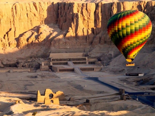 A picture of a hot air balloon while on a ride above Luxor in Egypt.