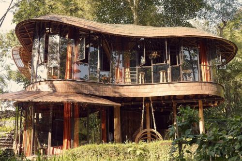 A picture of a riverside palace in the eco-friendly retreat Bambu Indah in Bali, Indonesia.