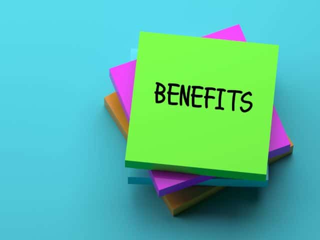 A picture of the word "benefits" written on a card.