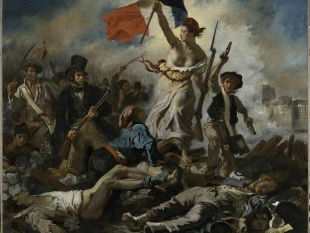 A picture of Liberty Leading the People inside of the Louvre Museum.