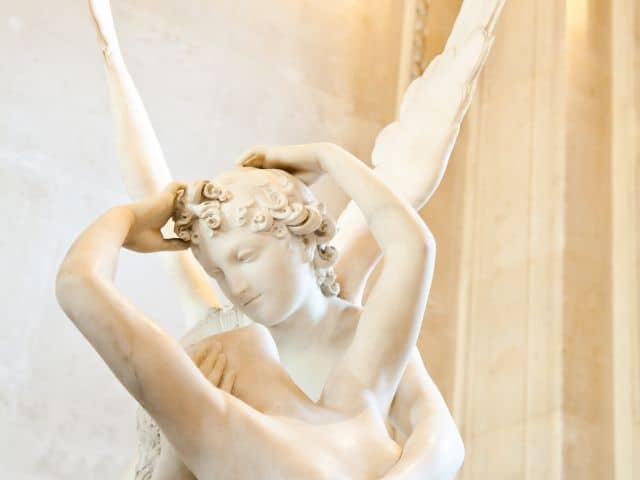 A picture of Psyche Revived by Cupid’s Kiss inside of the Louvre Museum in Paris, France.