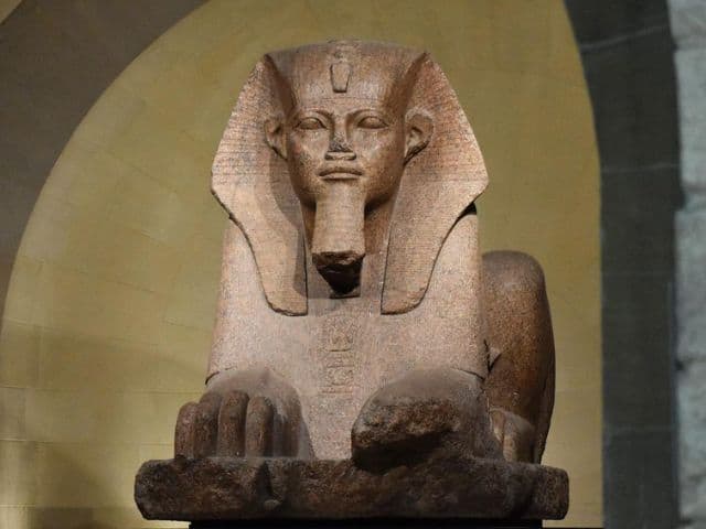 A picture of The Great Sphinx of Tanis inside of the Louvre Museum in Paris, France.