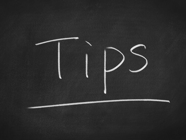 A picture of the word "Tips" written on a chalkboard background.