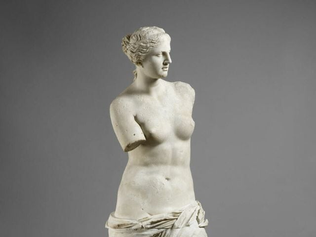 A picture of Venus de Milo inside of the Louvre Museum in Paris, France.