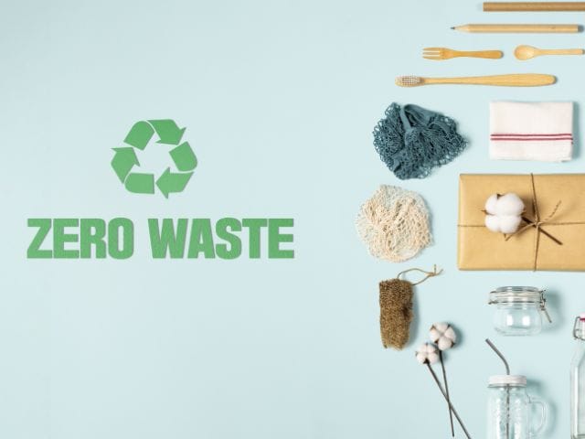 A picture of several zero-waste materials with the words zero waste written on the left in green.