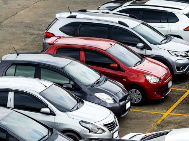 A picture of several parked car rentals.