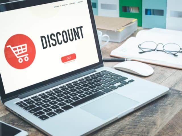 A picture of the word "discount" on a laptop screen.