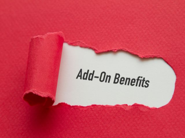 A picture of the words "add-on benefits" written under torn paper.