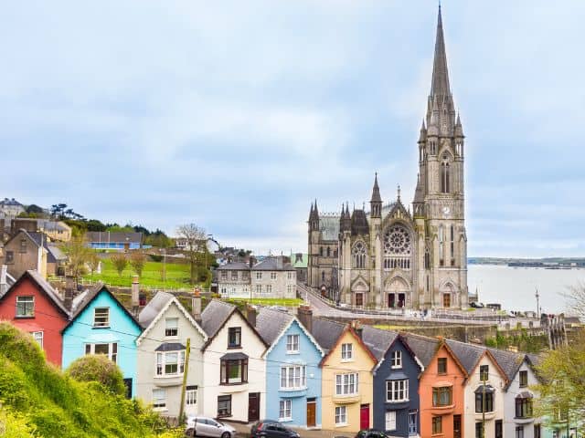 A picture of some buildings in Cobh, Ireland.