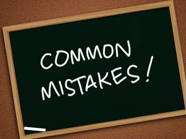 A picture of the words "common mistakes" written on a blackboard.